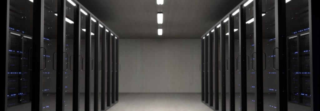 Photo of a server room including many enclosures